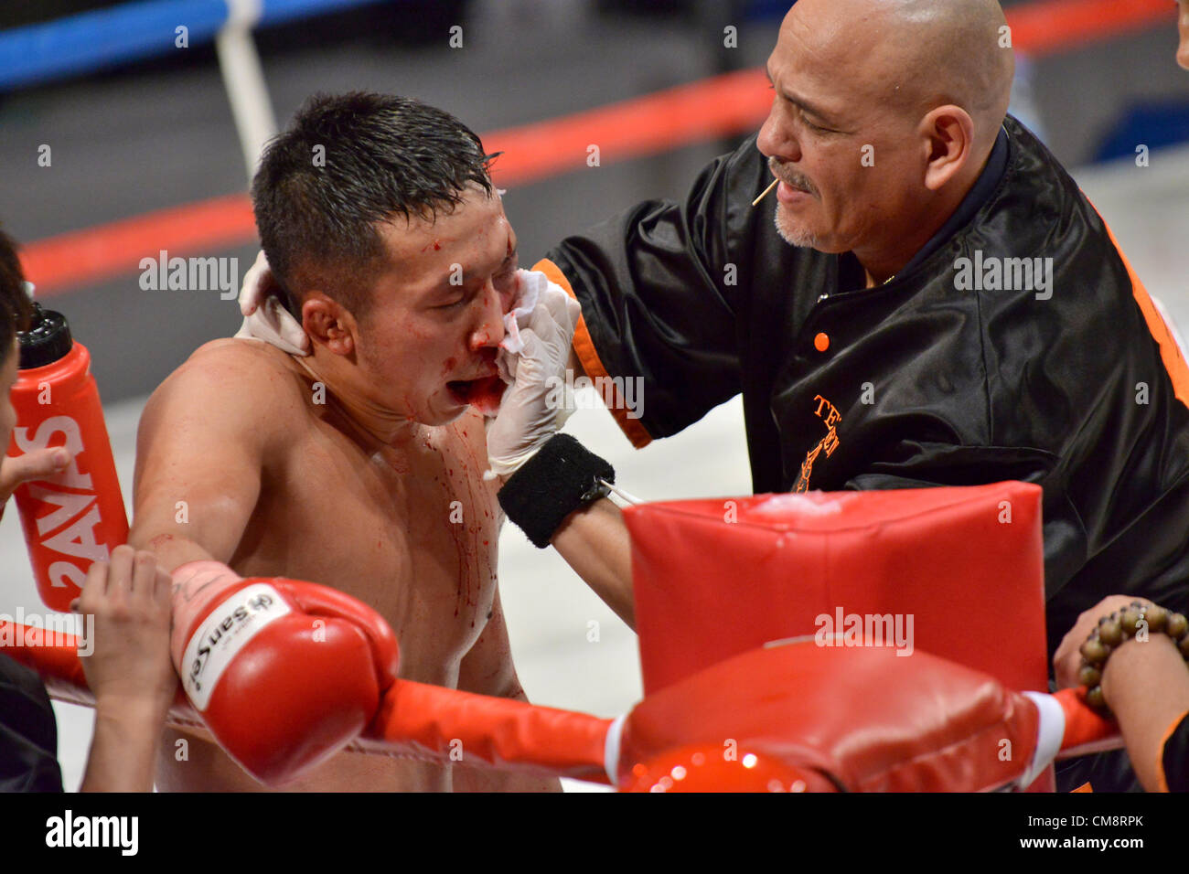 L-R) Takahiro Aou (JPN), Rudy Hernandez, OCTOBER 27, 2012 - Boxing :  Takahiro Aou of Japan receives medical treatment from his second Rudy  Hernandez after the final round of the WBC super