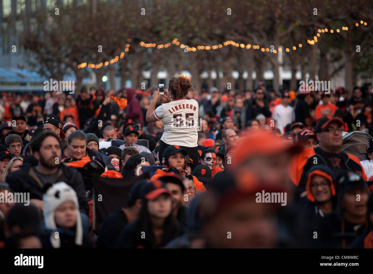 San Francisco, USA. 28th October 2012. Thousands of San Francisco Giants fans gather near City Hall in downtown San Francisco California to watch the San Francisco Giants and Detroit Tigers in game four of the World Series in Detroit Sunday October 28, 2012. Stock Photo