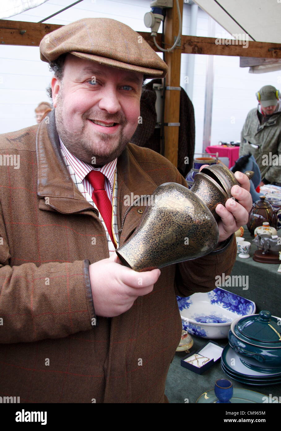 TV antiques expert James Lewis bargain hunting for an antique hunt & charity auction, Chesterfield flea market, Chesterfield,UK Stock Photo
