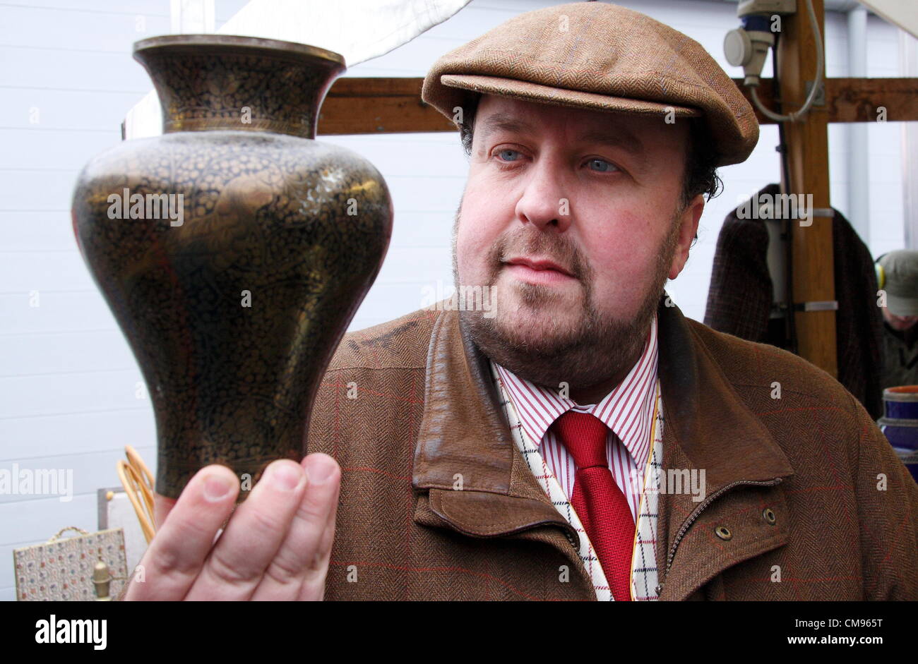 TV antiques expert James Lewis bargain hunting for an antique hunt & charity auction, Chesterfield flea market, Chesterfield,UK Stock Photo