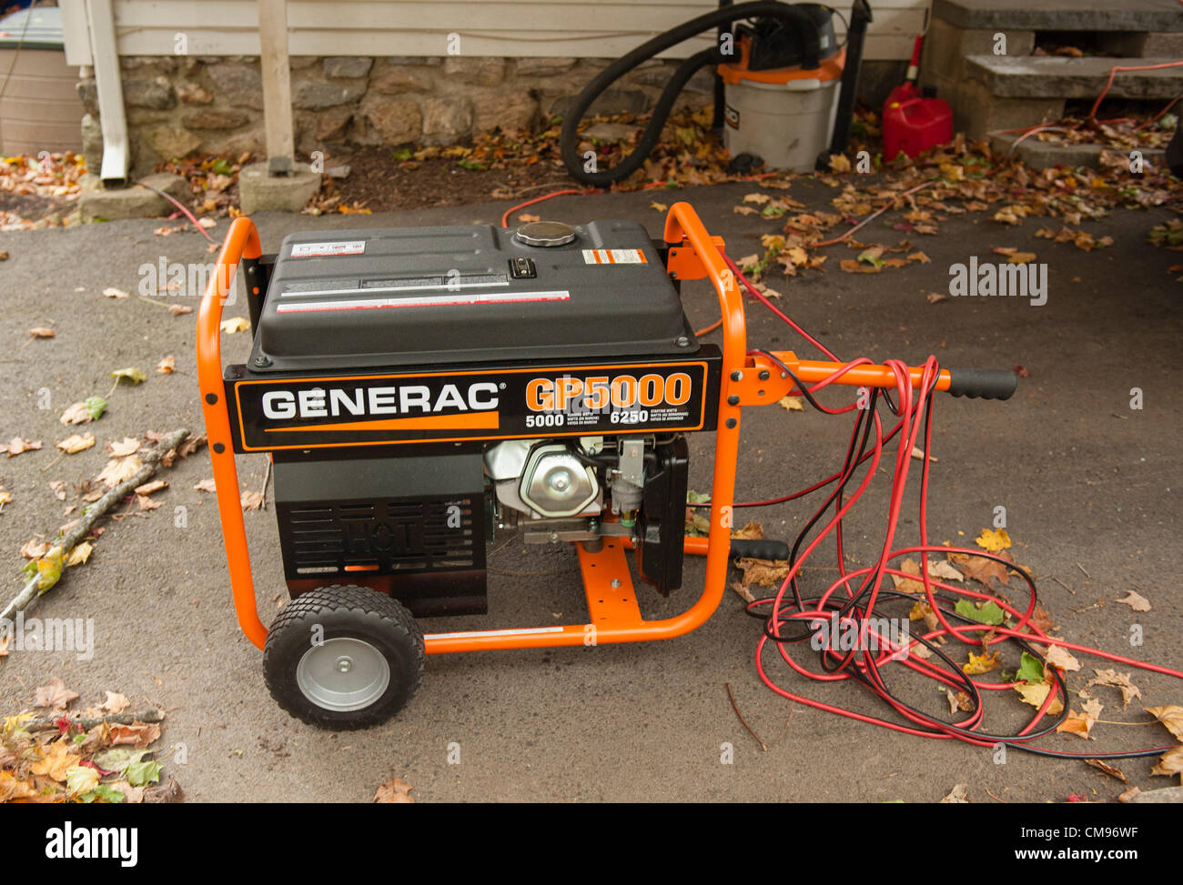 1 November 2012 Hurricane Sandy Day 4 : With much of the US East Coast including the New York suburbs still without power, some residents of Westchester County who purchased generators after last year's Hurricane Irene, manage to keep some lights on. Stock Photo