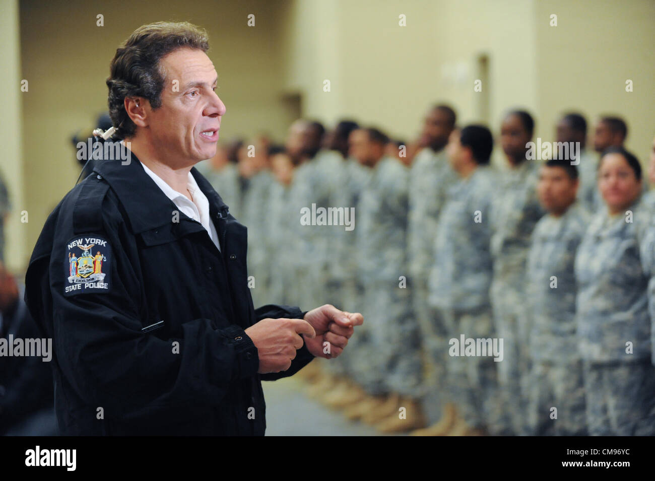 New York Governor Andrew Cuomo speaks to National Guard members in preparation for landfall of Hurricane Sandy October 30, 2012 in New York. Stock Photo