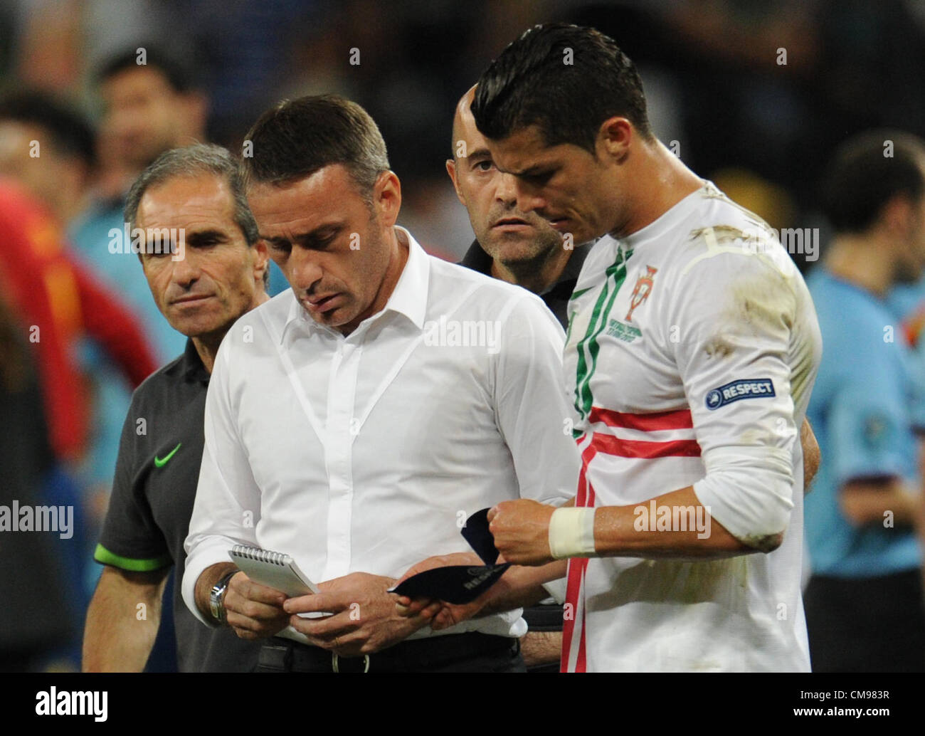 27.06.2012. Donetsk, Ukraine. Portugal's head coach Paulo Bento (L) talks to Cristiano Ronaldo about taking the penalties during UEFA EURO 2012 semi-final soccer match Portugal vs Spain at Donbass Arena in Donetsk, Ukraine, 27 June 2012. Stock Photo