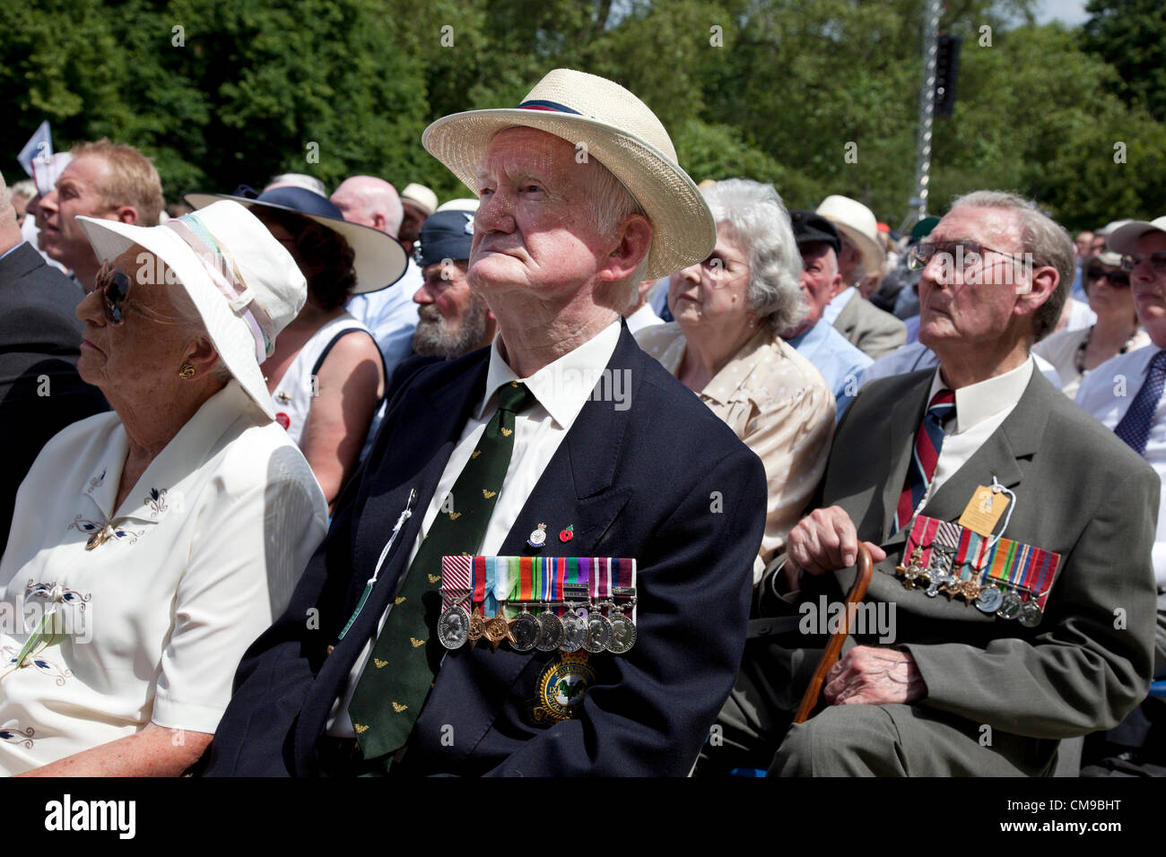 London, UK. 28/06/2012. Veterans and their families gather in Green park for a service to watch as the memorial to the 55,573 airmen of Bomber Command who died during World War II was unveiled. Some 6,000 attended the ceremony.  Stock Photo
