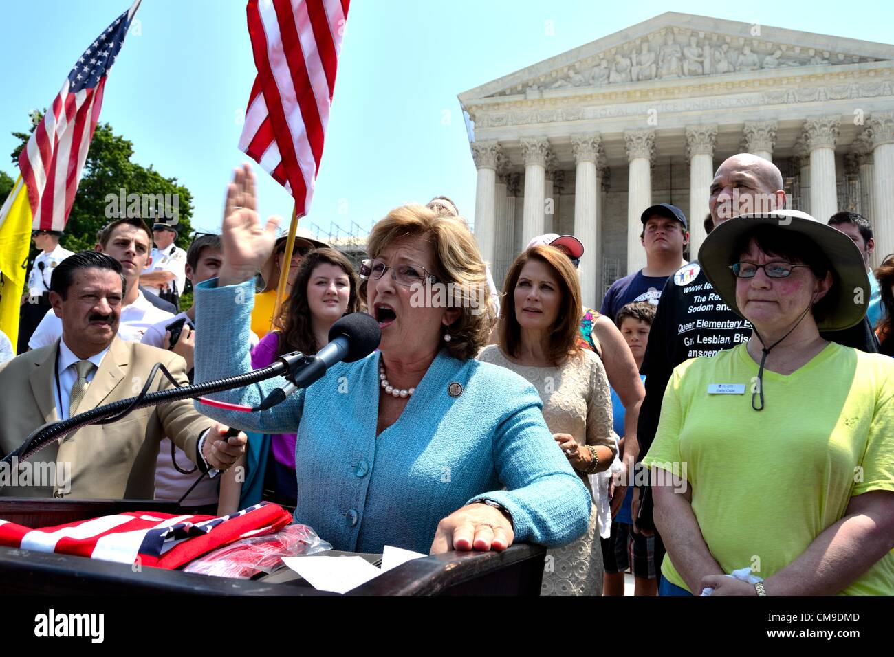 June 28. Washington, DC. U.S. Congresswoman Diane Black (R-Tennessee) speaks to conservatives about the Affordable Health Care ruling, in front of Supreme Court Building, while Congresswoman Michelle Bachmann (right of Black) (R-Minnesota) listens. Conservatives and Tea Party politicians assembled for the ruling on the Affordable Care Act.  Conservatives had hoped the Act would be overturned, but it was largely upheld. ©Ann Little Stock Photo