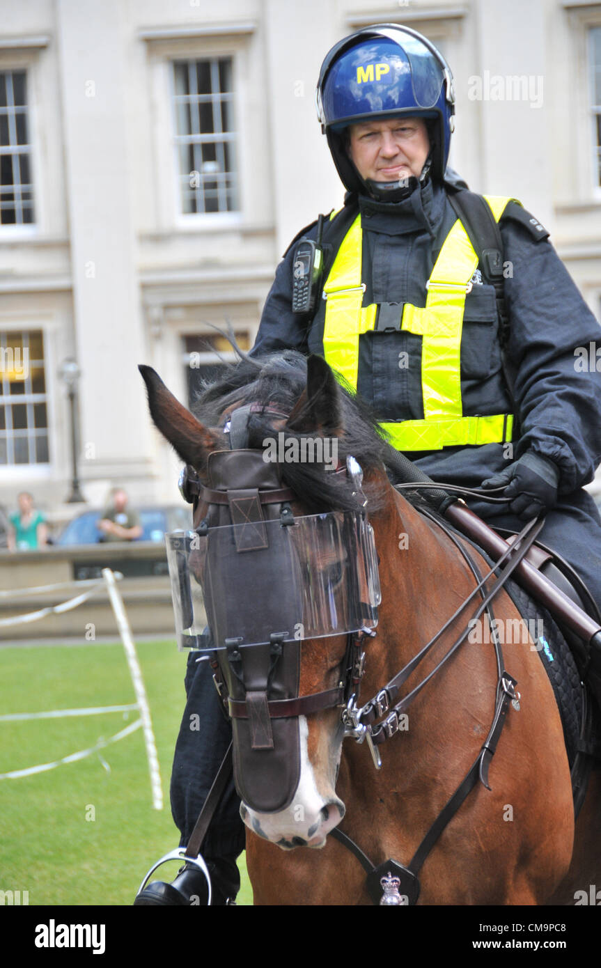 British Museum, London, UK. 30th June 2012. A Mounted Police officer and  horse, both with 'Riot gear', take part in the Horse Parade as part of Horse  Power Day, a day celebrating