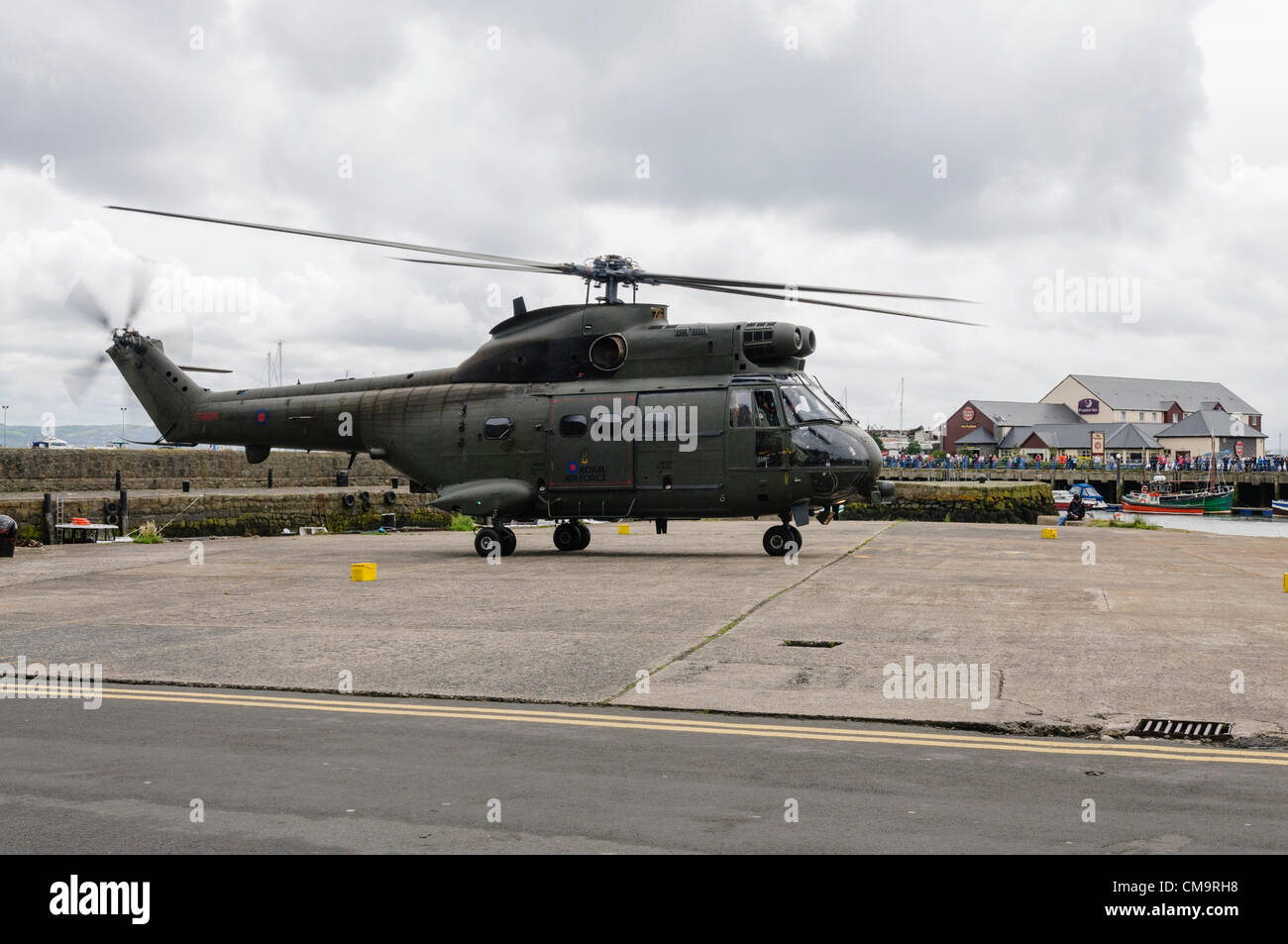 Carrickfergus, 30/06/2012 - Armed Forces Day. Royal Air Force Puma helicopter lands Stock Photo