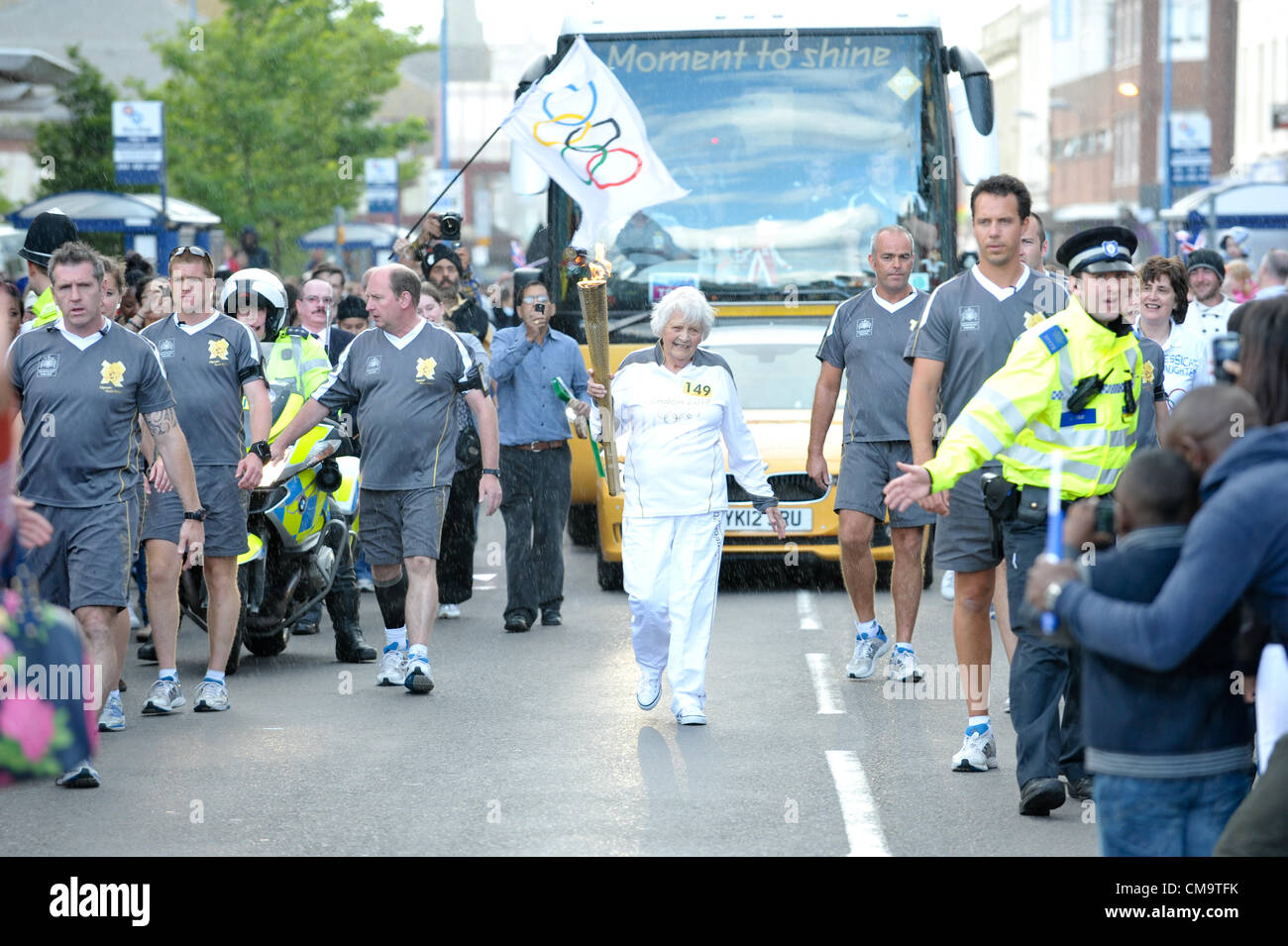 West Bromwich, Sandwell, UK - June 30th, 2012:  Jessica Gripton, aged 81, one of the oldest torchbearers. Jessica is a stalwart of Old Hill Tennis Club as well as Haden Hill and Halesowen swimming clubs Stock Photo