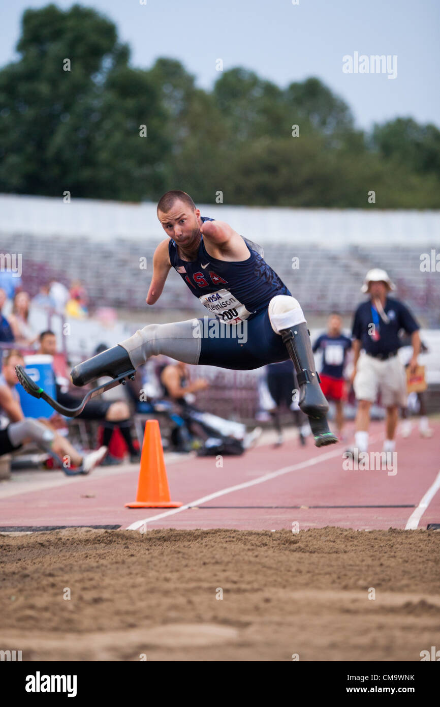 Indianapolis, IN, USA, June 30, 2012.  Joshua Kennison, a quadruple amputee, competes in the long jump at the 2012 U.S. Paralympic Trials for track and field.  Kennison's best jump hit 5.29m, a Paralympic world record in his competition class. Stock Photo