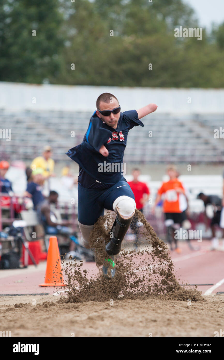 Indianapolis, IN, USA, 30 June 2012.  Joshua Kennison, a quadruple amputee, practices his long jump at the U.S. Paraympic Trials for track and field.  Kennison's best jump of the day was 5.29m, a world record in his competition class. Stock Photo