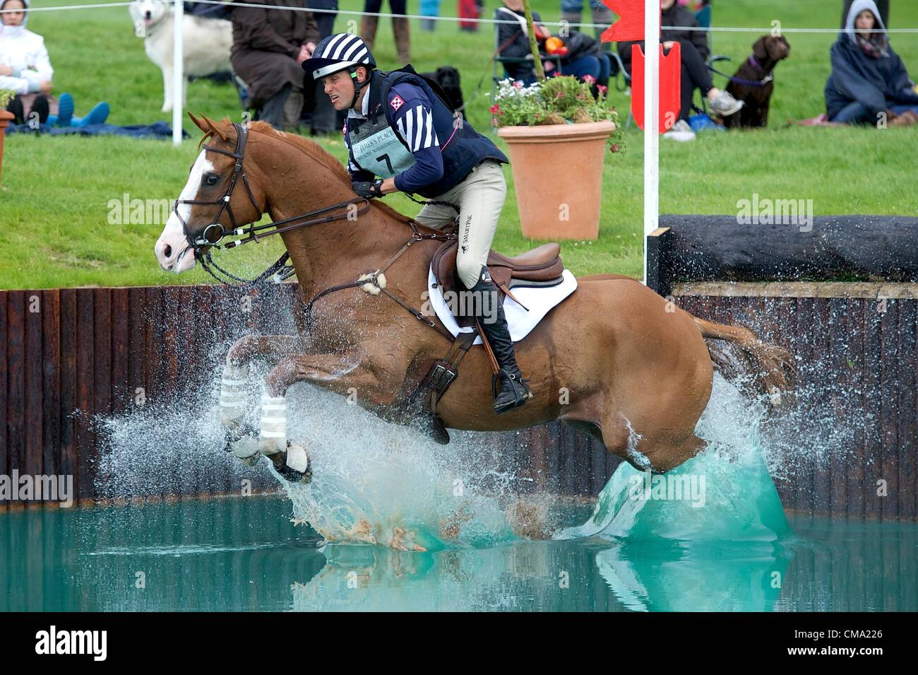 01.07.2012 Barbury Castle International Horse Trials, Marlborough, England. America's Boyd Martin riding Neville Bardos enters the water during the CIC*** Cross Country. Stock Photo