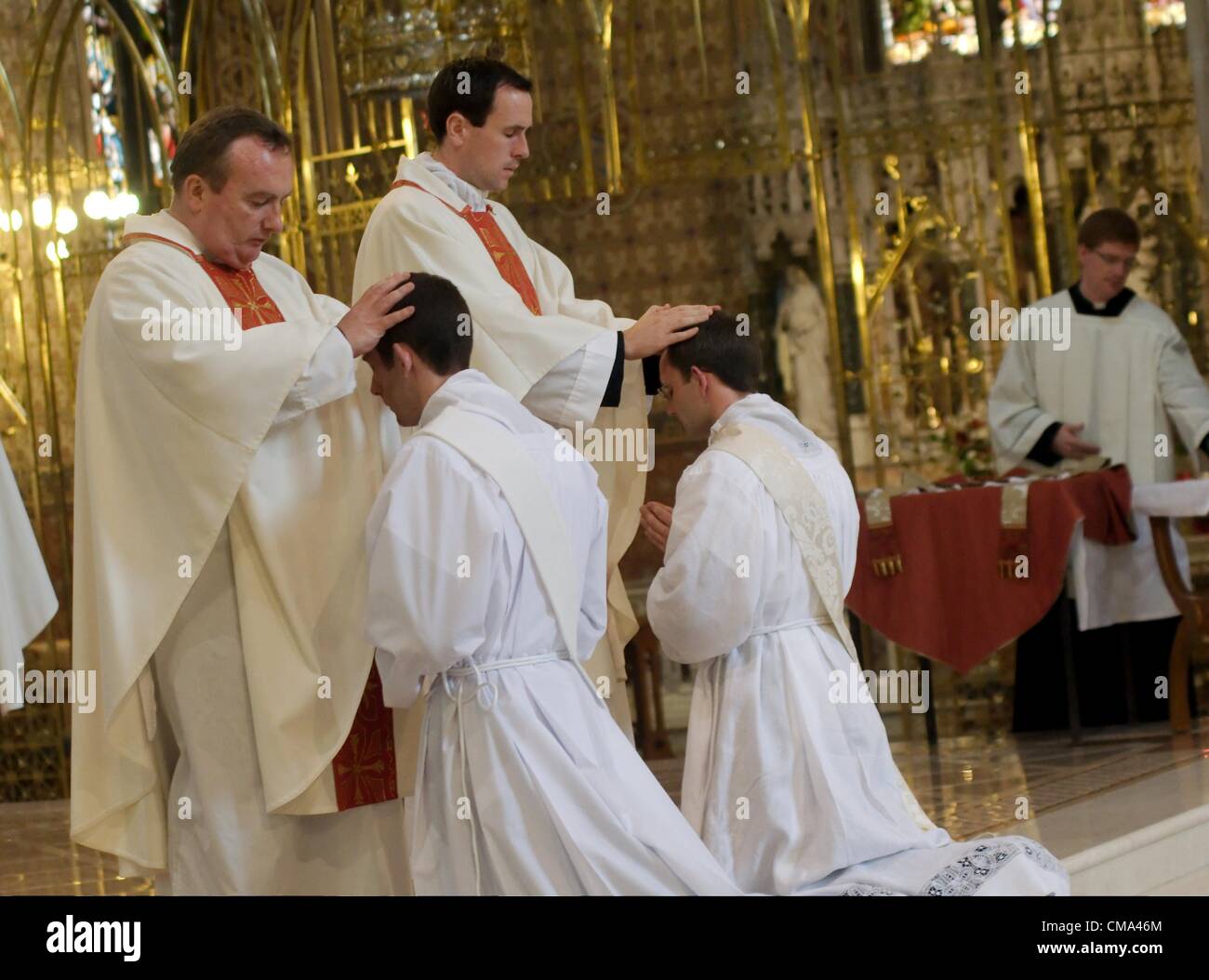 The Laying On Of Hands Priests From Archdiocese Ofarmagh Lay Hands Stock Photo Alamy