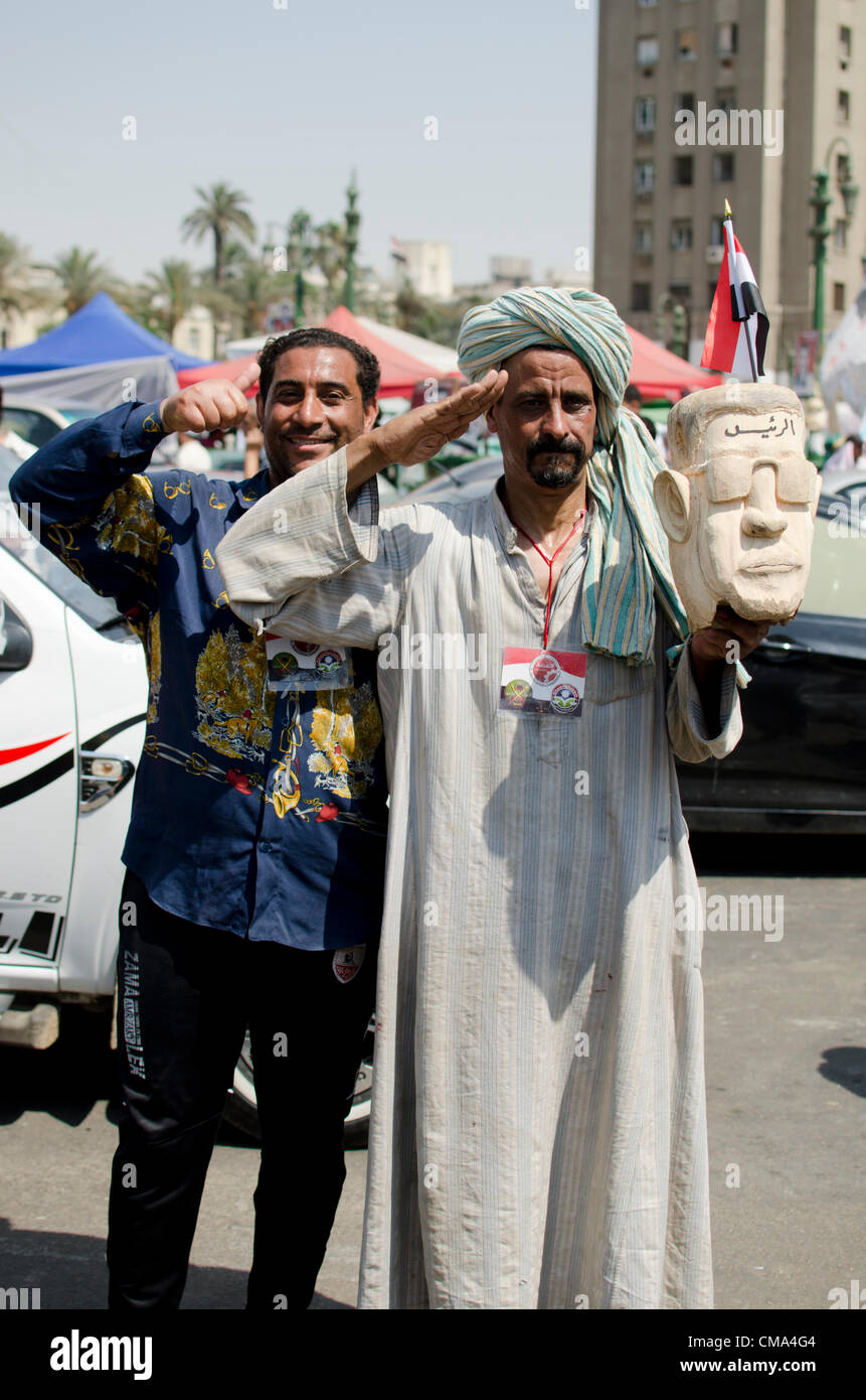 Supporters of the presidential candidate Mohammed Morsi celebrate the election results in Cairo's Tahrir Square in Egypt on Sunday July 01, 2012. Stock Photo
