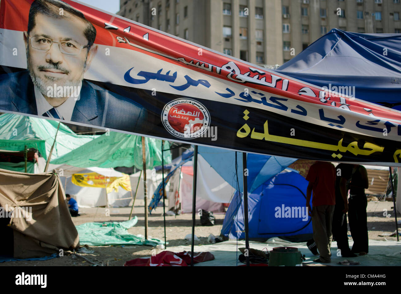 Supporters of the presidential candidate Mohammed Morsi camp out in Cairo's Tahrir Square in Egypt on Sunday July 01, 2012. Stock Photo