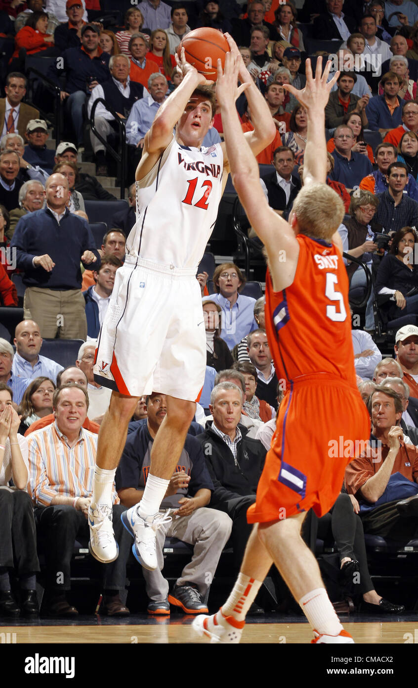 Jan. 31, 2012 - Charlottesville, Virginia, United States - The Virginia Cavaliers guard Joe Harris (12) shoots over Tanner Smith #5 of the Clemson Tigers during the game at the John Paul Jones Arena in Charlottesville, Virginia. Virginia defeated Clemson 65-61. (Credit Image: © Andrew Shurtleff/ZUMAPRESS.com) Stock Photo