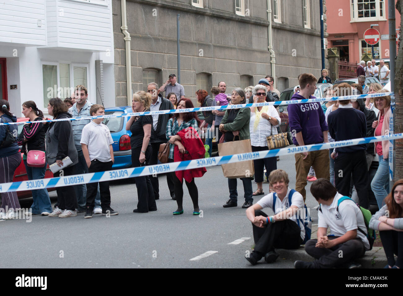 Thursday 5 July 2012 Police were called to a siege in a house in Portland Street, Aberystwyth Wales UK. The centre of the town was sealed off, with cars and pedestrians prevented from moving.  At 16.45 a man in his 40's was led out of the house by officers and taken away for questioning. Stock Photo