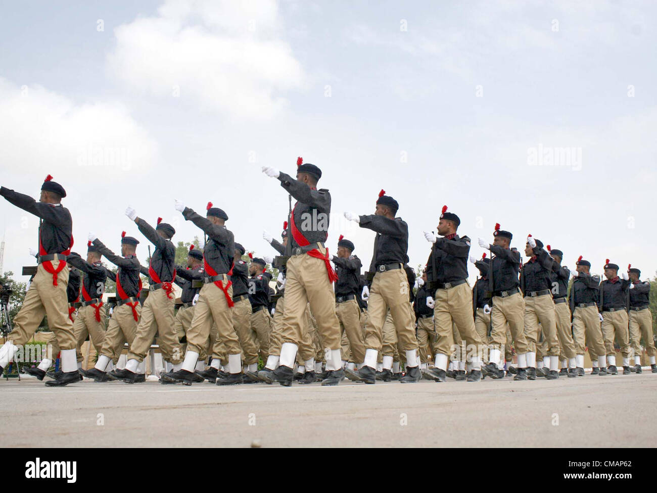 Sindh Police (SP) recruits march-past during passing out  parade ceremony held at Razzaqabad police training center in Karachi on Friday, July 06, 2012. Stock Photo