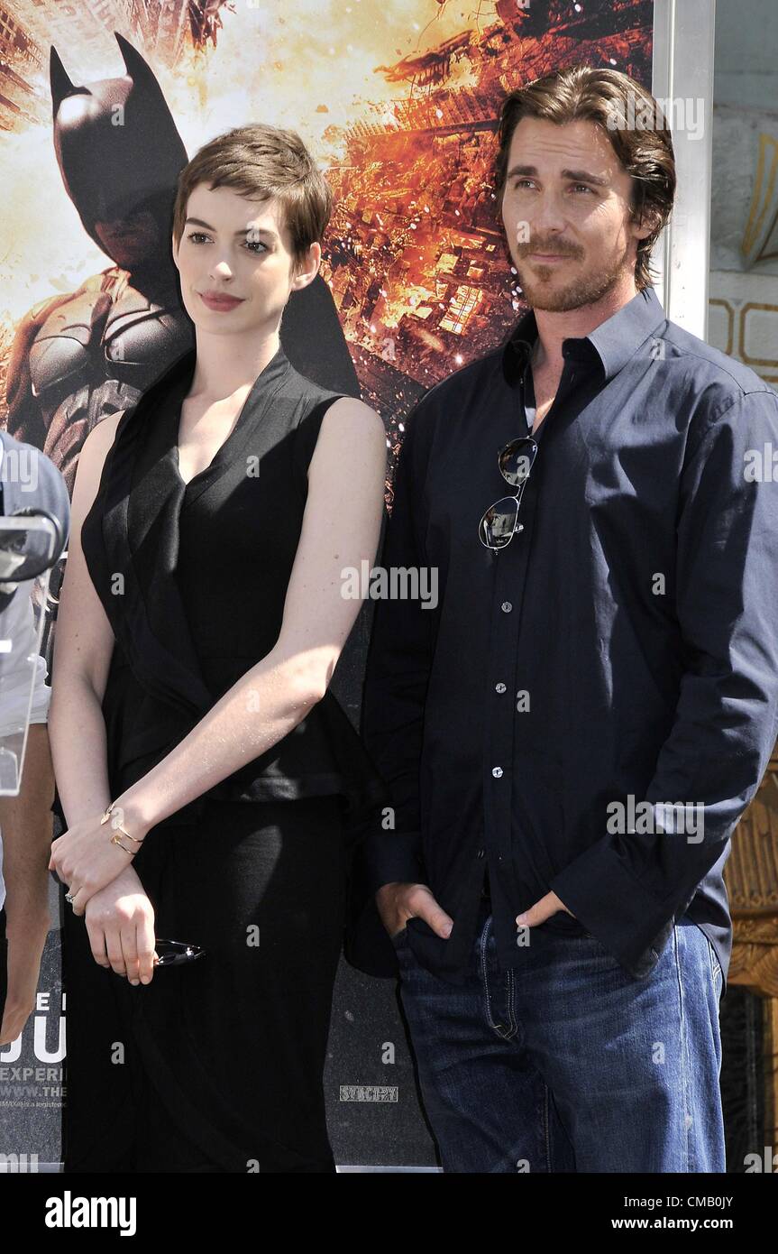 Anne Hathaway, Christian Bale in attendance for Handprint Ceremony for  Christopher Nolan at Grauman's, Grauman's Chinese Theatre, Los Angeles, CA  July 7, 2012. Photo By: Michael Germana/Everett Collection Stock Photo -  Alamy