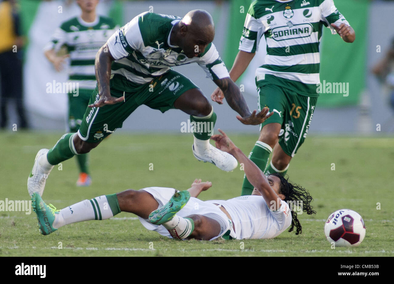 July 9, 2012 - Carson, California, USA - Felipe Baloy #23 of Santos Laguna is brought down by a Club Leon defender, as both teams from Mexico  faced each other  in a friendly match at the Home Depot Center in Carson, California, Sunday, 8 July, 2012  (Credit Image: © Javier Rojas/Prensa Internacional/ZUMAPRESS.com) Stock Photo