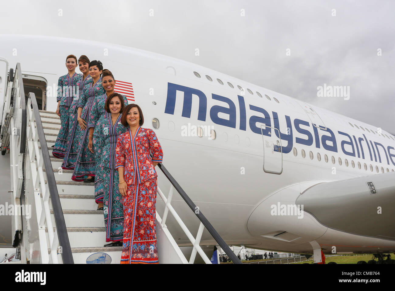 Farnborough International Airshow 2012. 9-07. 2012 . Malaysia Airlines new Airbus A380 with Cabin air crew. Stock Photo