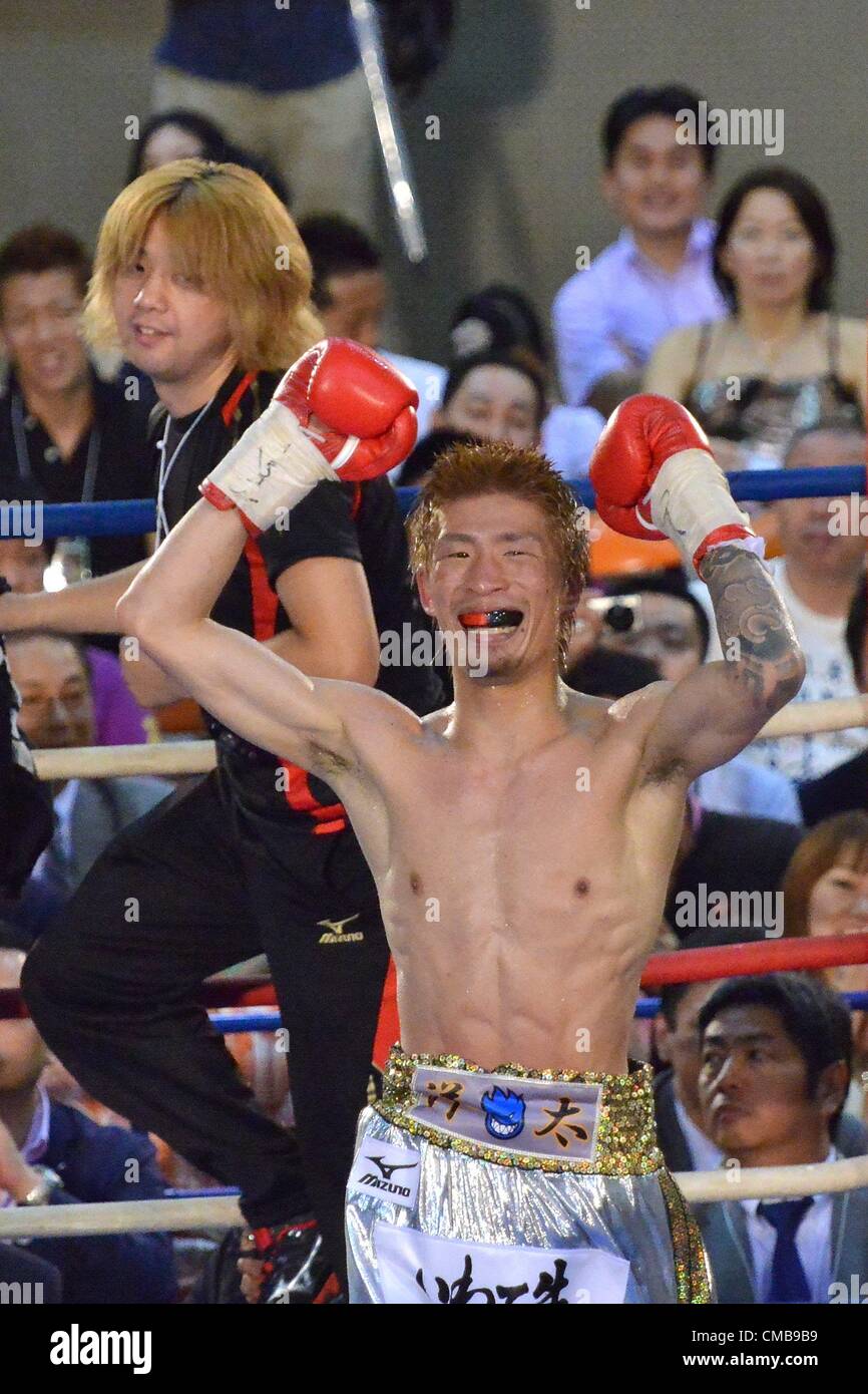 Yota Sato (JPN), Shiro Arai, JULY 8, 2012 - Boxing : Yota Sato of Japan  celebrates his unanimous decision victory as his trainer Shiro Arai (L)  looks on after the WBC super