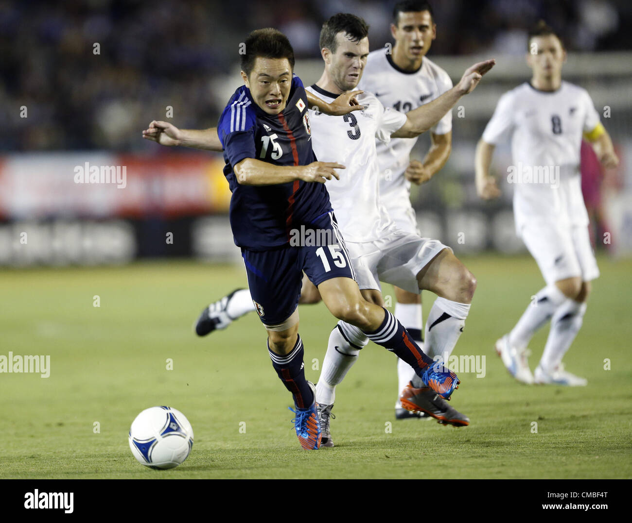 July 11, 2012 - Tokyo, Japan - Japan's MANABU SAITO (L) fights for the ball against New Zealand's during their U-23 soccer international friendly match ahead of the 2012 London Olympic Games, in Tokyo July 11, 2012. (Credit Image: © Shugo Takemi/Jana Press/ZUMAPRESS.com) Stock Photo
