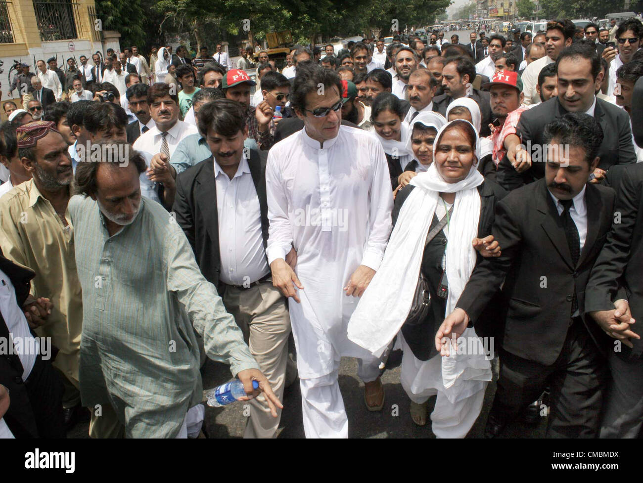Tehreek-e-Insaf Chairman, Imran Khan along with lawyers pass through at ...