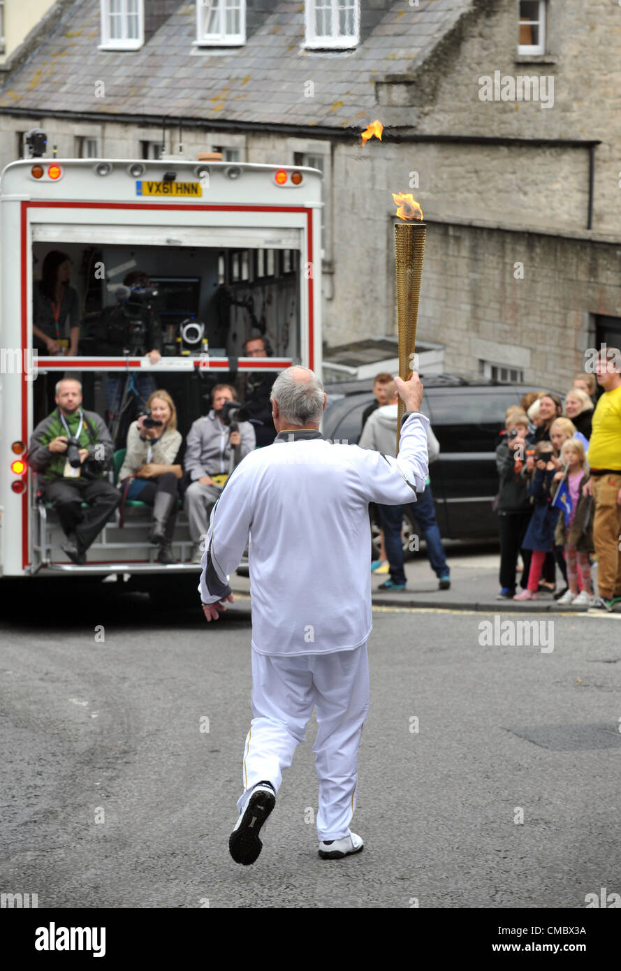 Day 56 of the torch relay around the UK…The torch passing through Fortuneswell, Portland in Dorset. Britain. 13/07/2012 PICTURE BY: DORSET MEDIA SERVICE Stock Photo