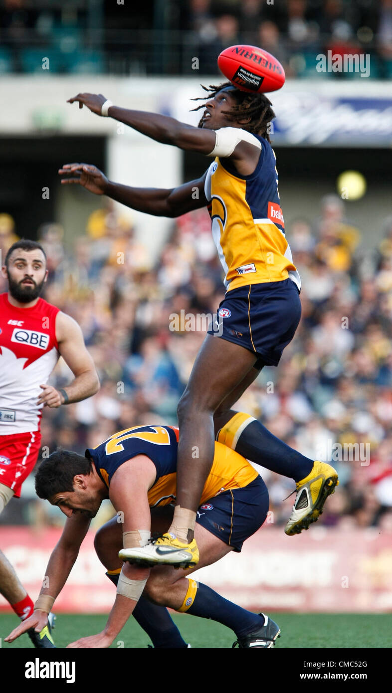 15.07.2012 Subiaco, Australia. West Coast v Sydney Swans. Nic Naitanui jumps over Dean Cox only to miss the ball during the Round 16 game played at Patersons Stadium. Stock Photo