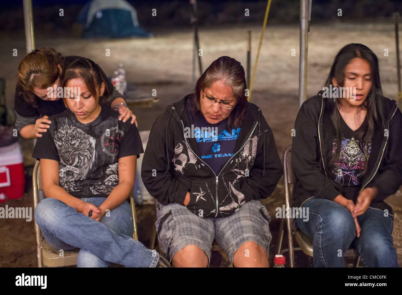July 13, 2012 Ft. Defiance, Arizona, U.S TANIA LEMMON (left) prays