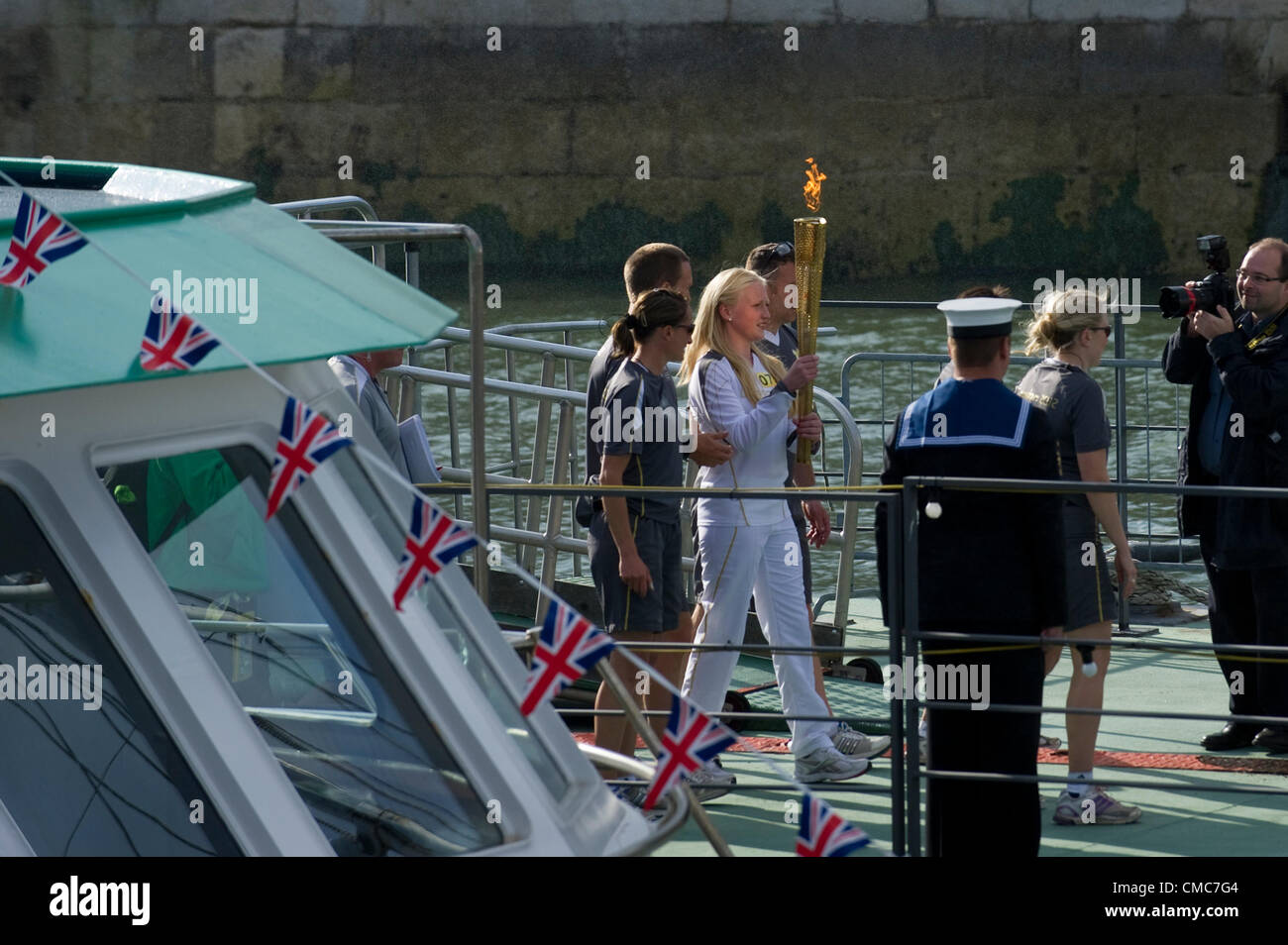Thousands of people gather in Portsmouth to the Olympic Torch