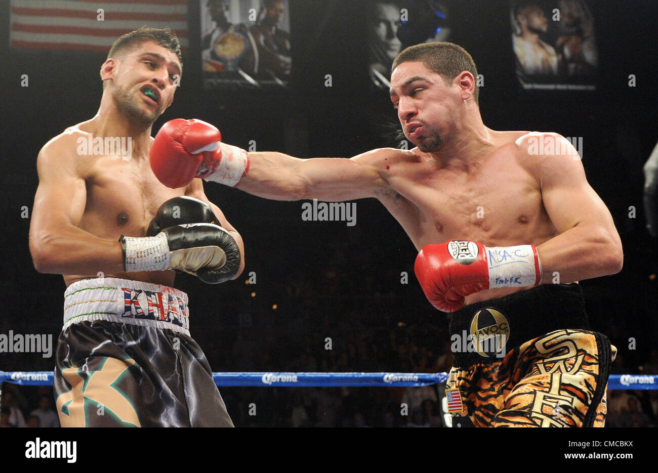 (L-R) Amir Khan (GBR), Danny Garcia (USA), JULY 14, 2012 - Boxing : Danny Garcia of the United States hits Amir Khan of Great Britain during the WBC and WBA super lightweight titles bout at Mandalay Bay Events Center in Las Vegas, Nevada, United States. (Photo by Naoki Fukuda/AFLO) Stock Photo