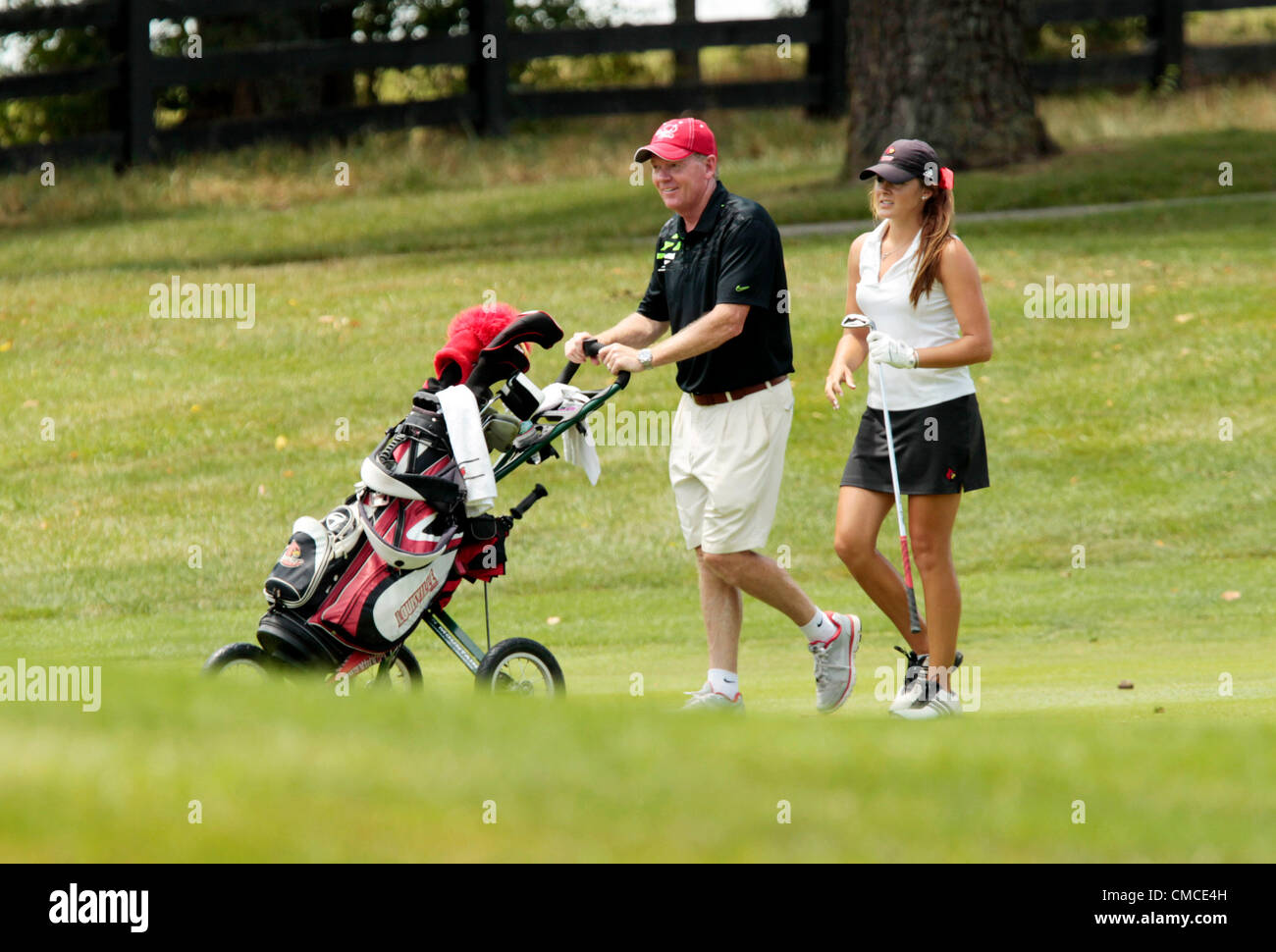 July 17, 2012 - Nicholasville, Ky, US - Bobby Petrino caddied for his daughter, Katie Petrino during the Lexmark Kentucky Women's Open at Champion Trace Golf Club.... in Nicholasville, Ky., on July 17, 2012. Pablo Alcala | Staff (Credit Image: © Lexington Herald-Leader/ZUMAPRESS.com) Stock Photo