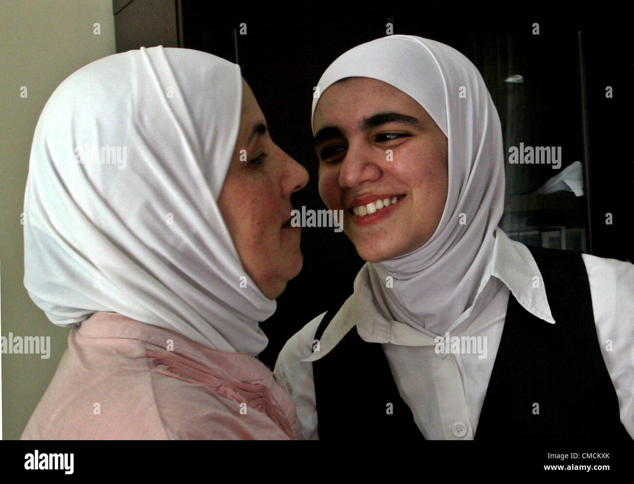 July 19, 2012 - Nablus, West Bank, Palestinian Territory - A Palestinian high school student and the first in section science , Dima Jabri, after hear her result  in the West Bank City of Nablus on July 19, 2012. The Ministry of Education in Gaza Strip and the West Bank announced the results together  (Credit Image: © Nedal Eshtayah/APA Images/ZUMAPRESS.com) Stock Photo