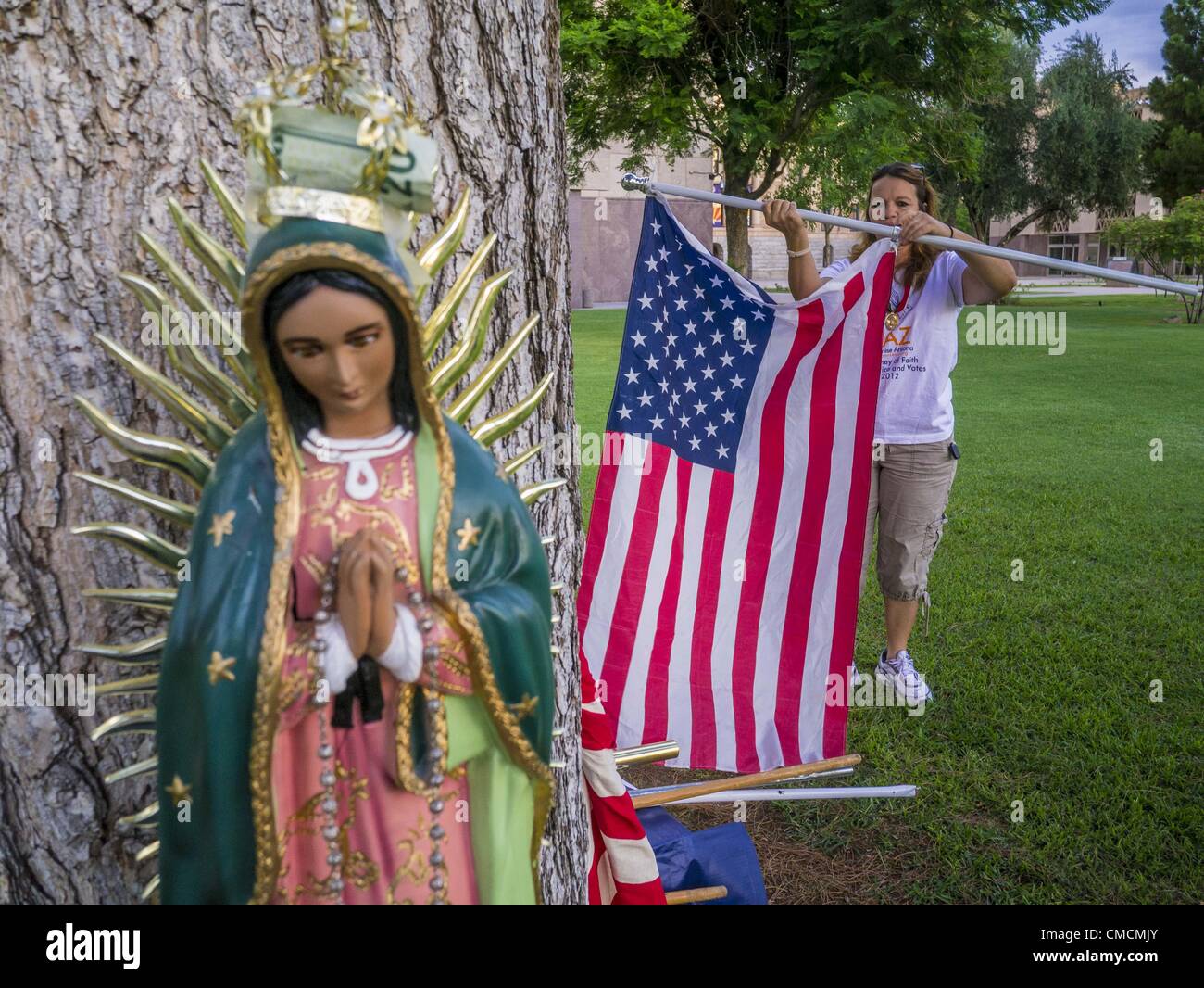 July 19, 2012 Phoenix, Arizona, U.S MARIA URIBE unfurls an American