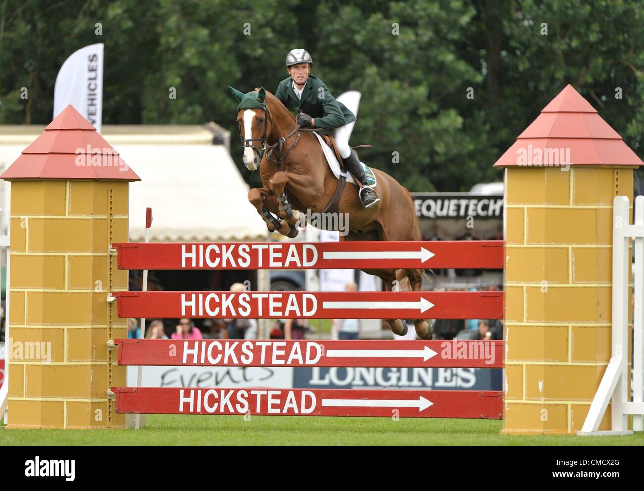 20.07.2012 The All England Jumping Course  Hickstead, England.  Richie MOLONEY [IRL] riding AHORN VAN DE ZUUTHOEVE in action during The FEI Nations Cup at The Longines Royal International Horse Show. Stock Photo