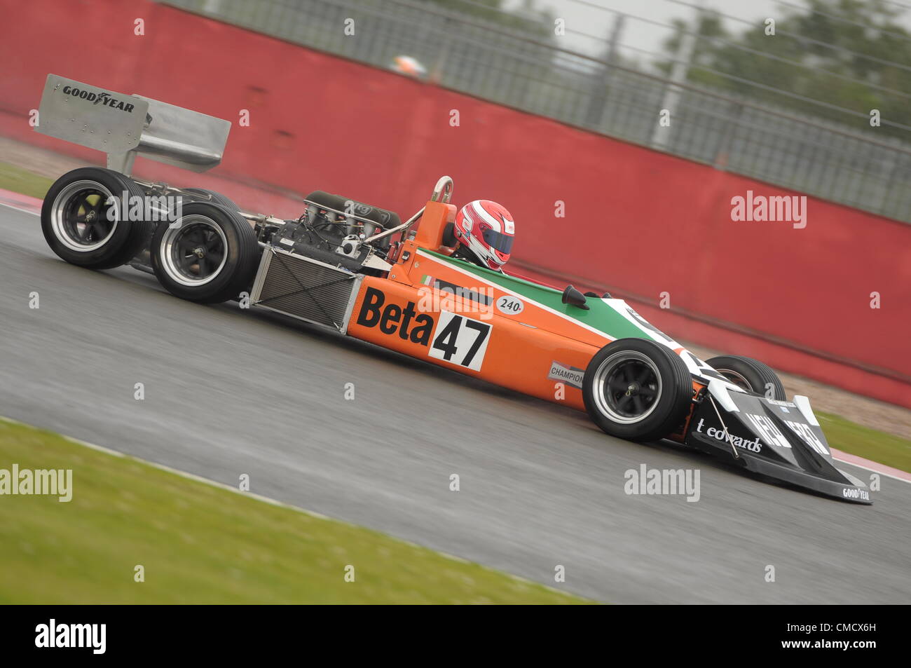 20th July 2012, Silverstone, UK Jeremy Smith's March 2-4-0 in the wet during qualifying for the Daily Express International Trophy for Grand Prix Masters race at Silverstone Classic 2012 Stock Photo