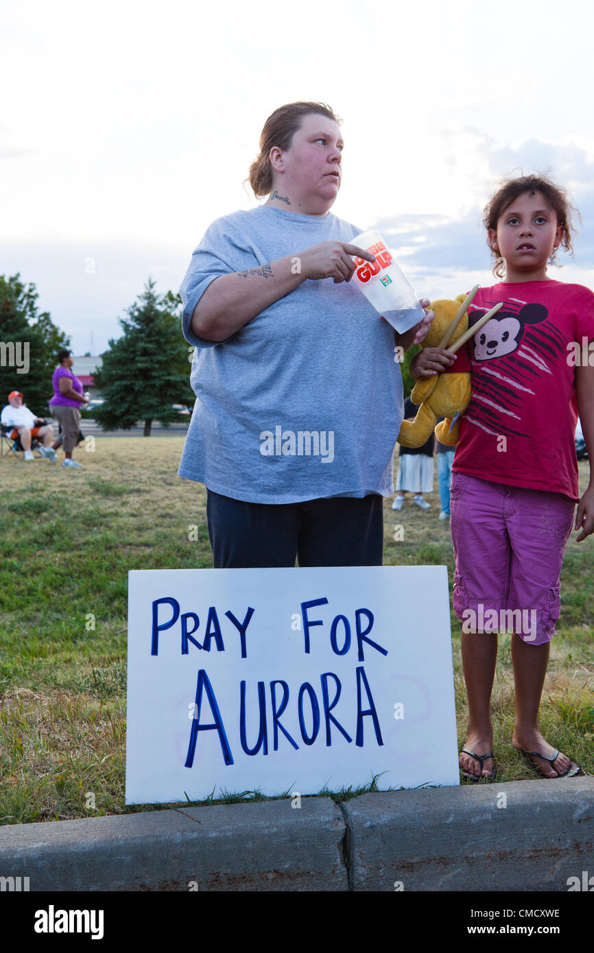 Aurora, Colorado, USA. 20th July, 2012. A crowd gathers for an impromptu prayer vigil across the street from the Century 16 Theater on July 20, 2012 where suspected gunman James Holmes killed 12 people and injured more than fifty. Stock Photo