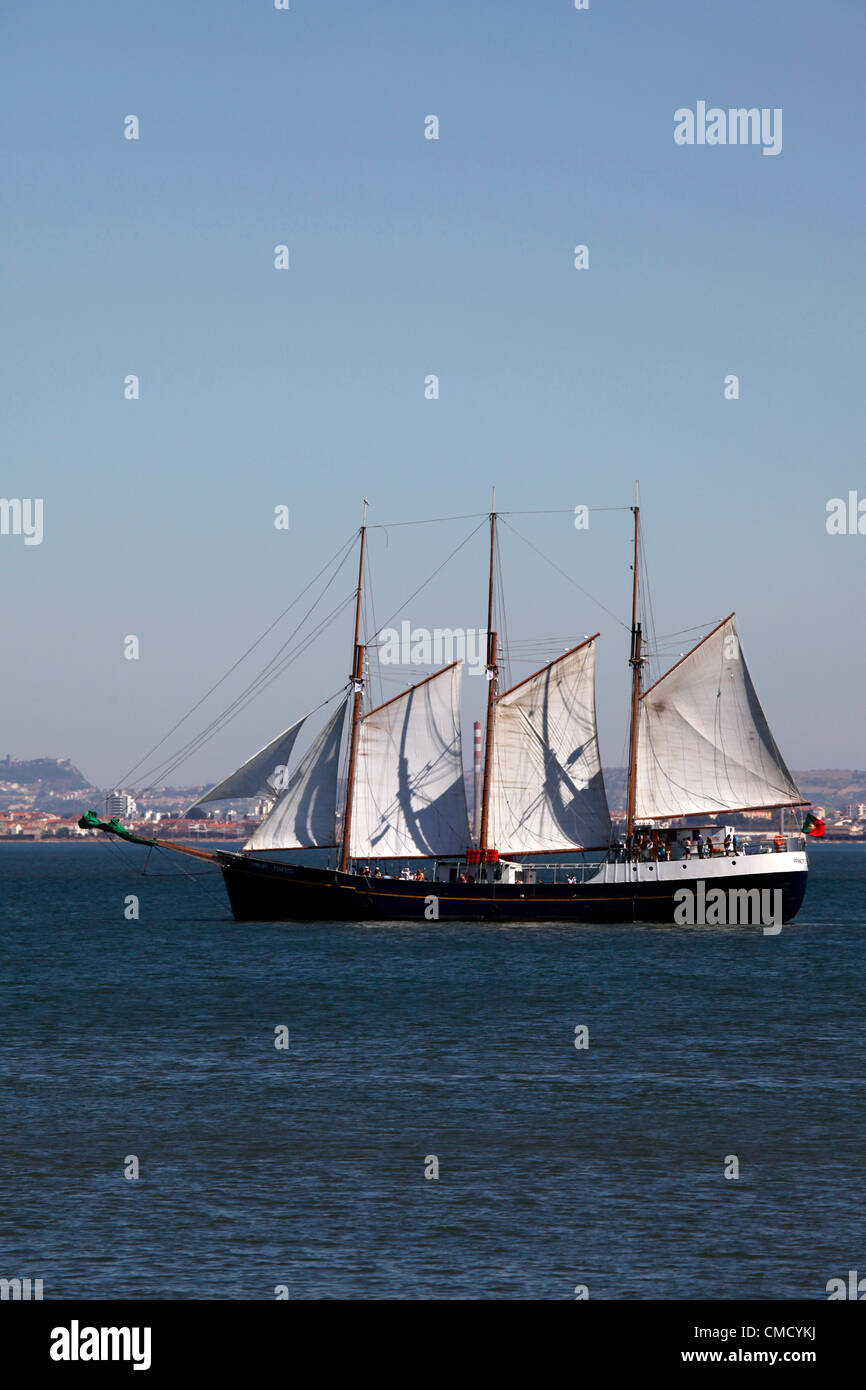 The fully rigged Principe Perfeito sailing ship sails on the River Tagus in Lisbon, Portugal. Stock Photo