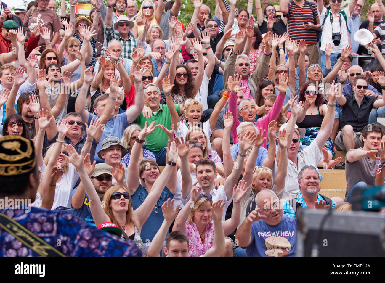 BRISTOL, UK, 21st July, 2012. A happy audience shows its appreciation