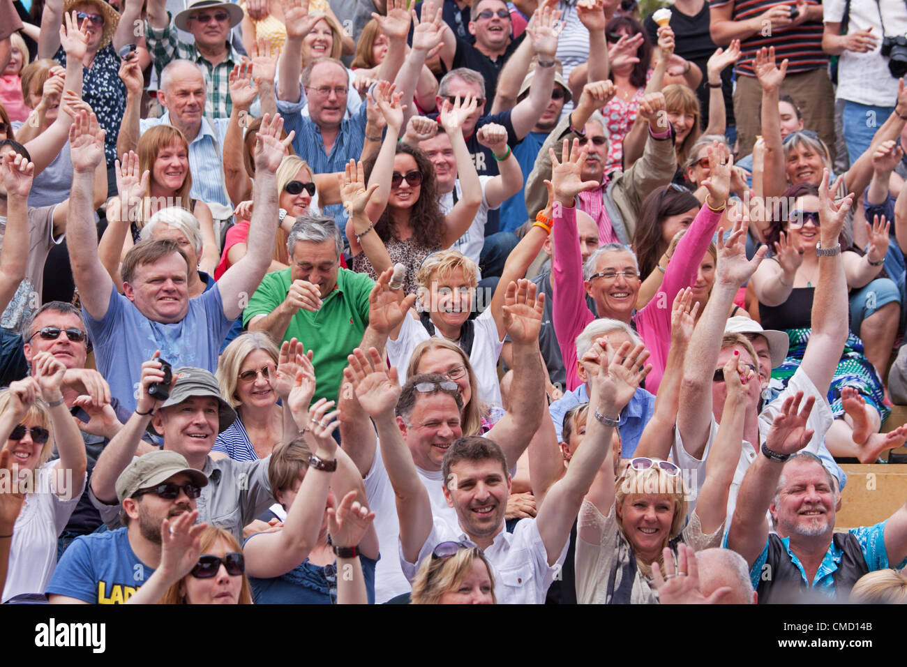 BRISTOL, UK, 21st July, 2012. A happy audience shows its appreciation