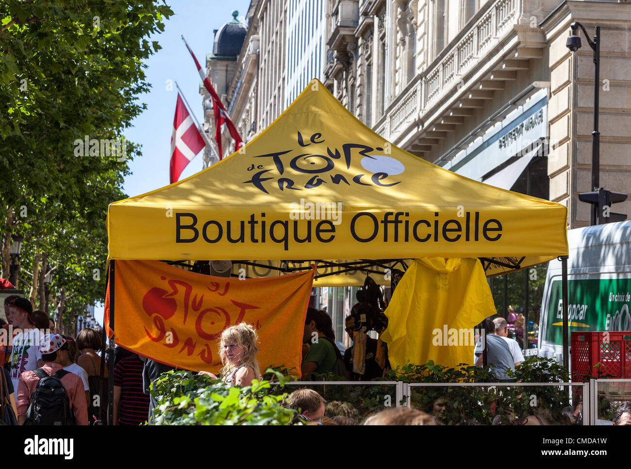 Paris,France,July 22 2012: Image of the 'Boutique Officielle' full with specific souvenirs of Le Tour de France on the Champs Elysees Boulevard during the last stage of Tour of France 2012 in Paris,France. Stock Photo