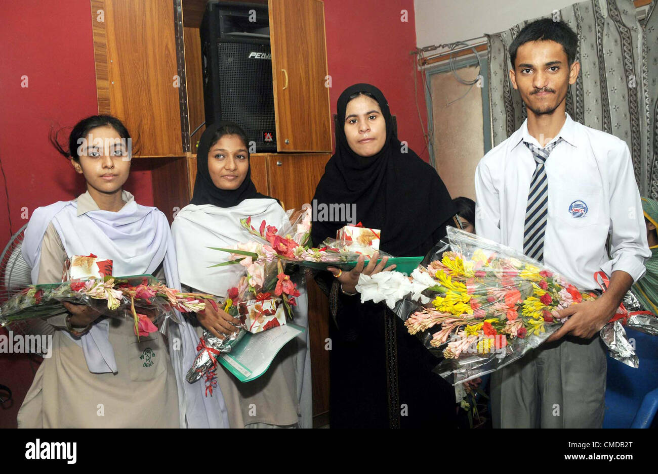 A group photo of position holder students on occasion of result