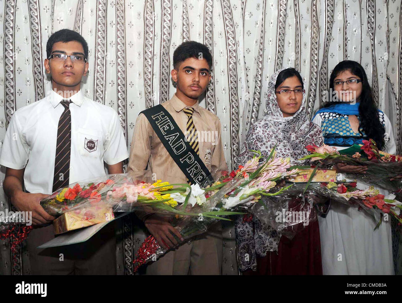 A group photo of position holder students on occasion of result