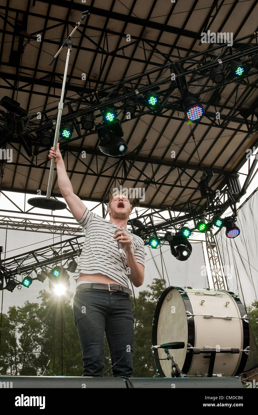 Singer / frontman Rock star / musician Dan Reynolds of the alt rock  indie rock  indy rock band Imagine Dragons | Performing and singing at the original outdoor summer Firefly Alternative Music Festival in 2012 by Red Frog Events | concert venue located in Dover, Delaware, United States Stock Photo