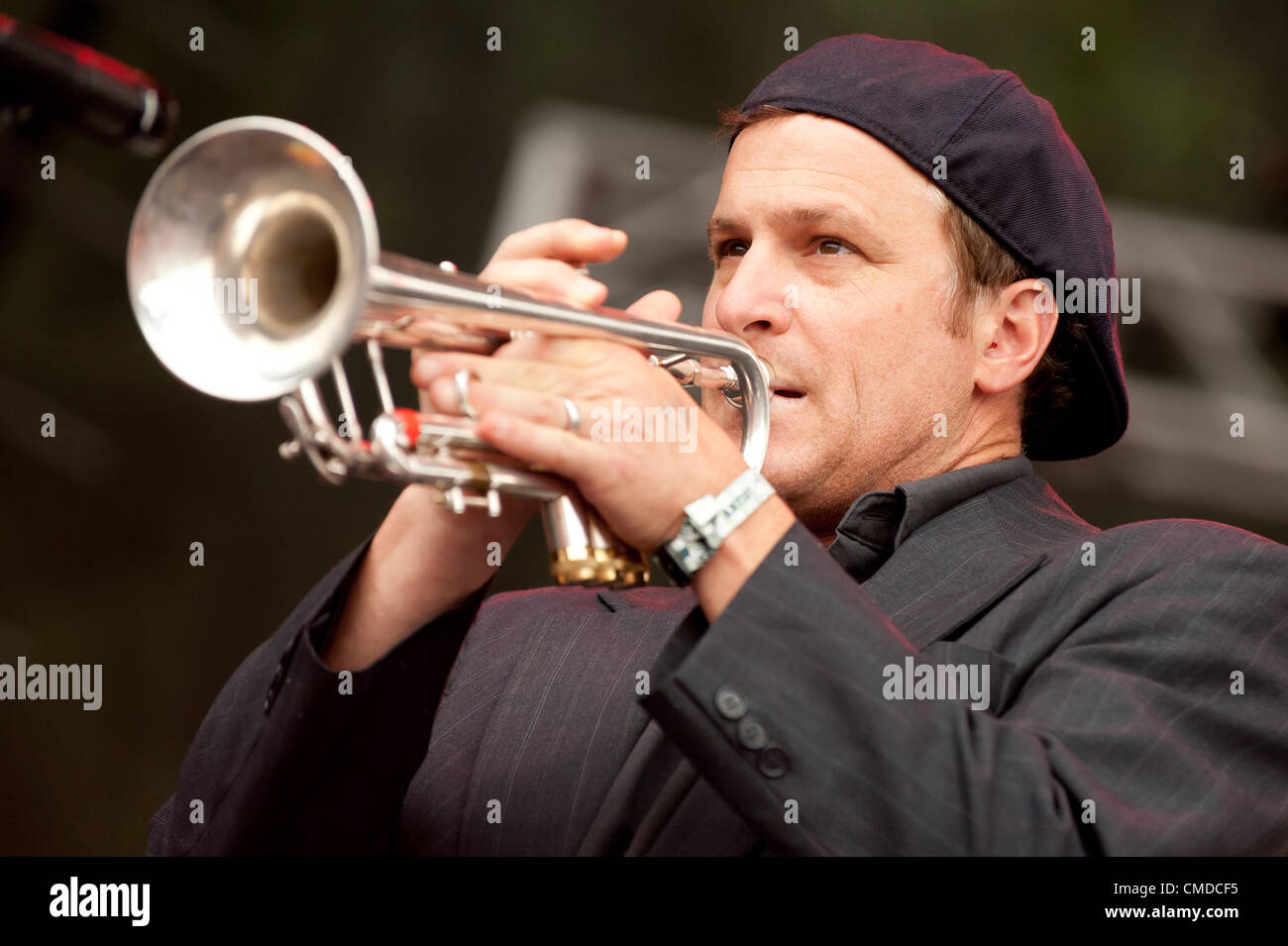 Rock star / musician Vince DiFiore of the alt rock  indie rock  indy rock band Cake | Performing / playing trumpet at the original outdoor summer Firefly Alternative Music Festival in 2012 by Red Frog Events | concert venue located in Dover, Delaware, United States Stock Photo
