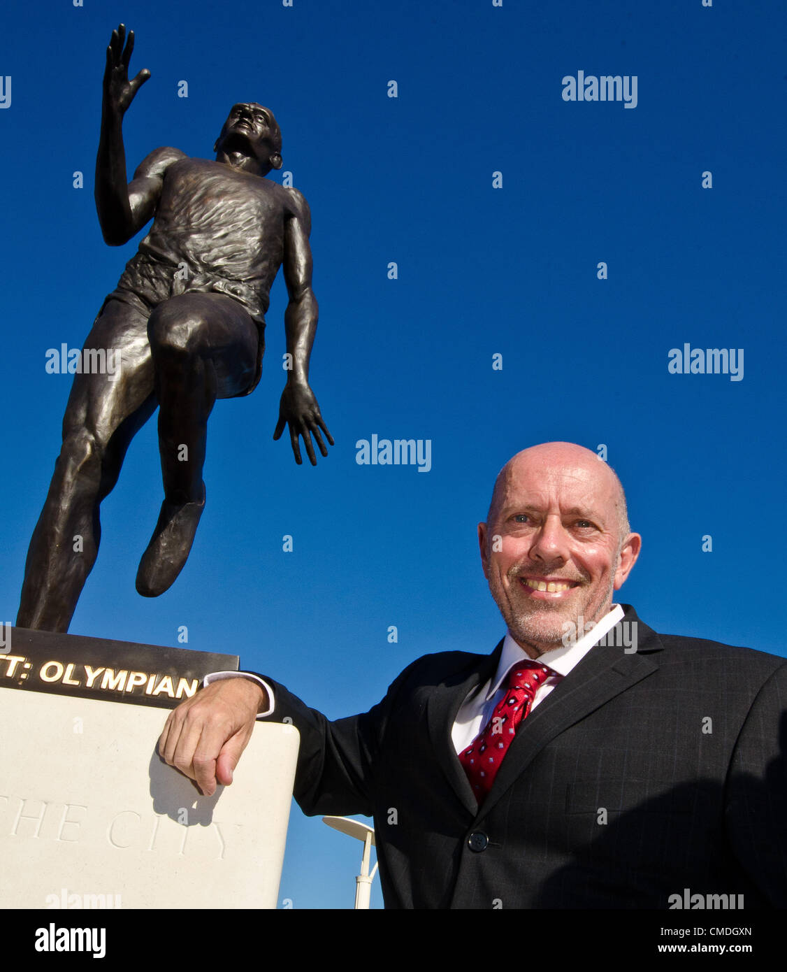 Olympic Gold Medallist Steve Ovett with sculptor Pete Webster's statue of him which was unveiled today. Tuesday 24th July 2012 photo©Julia Claxton Stock Photo