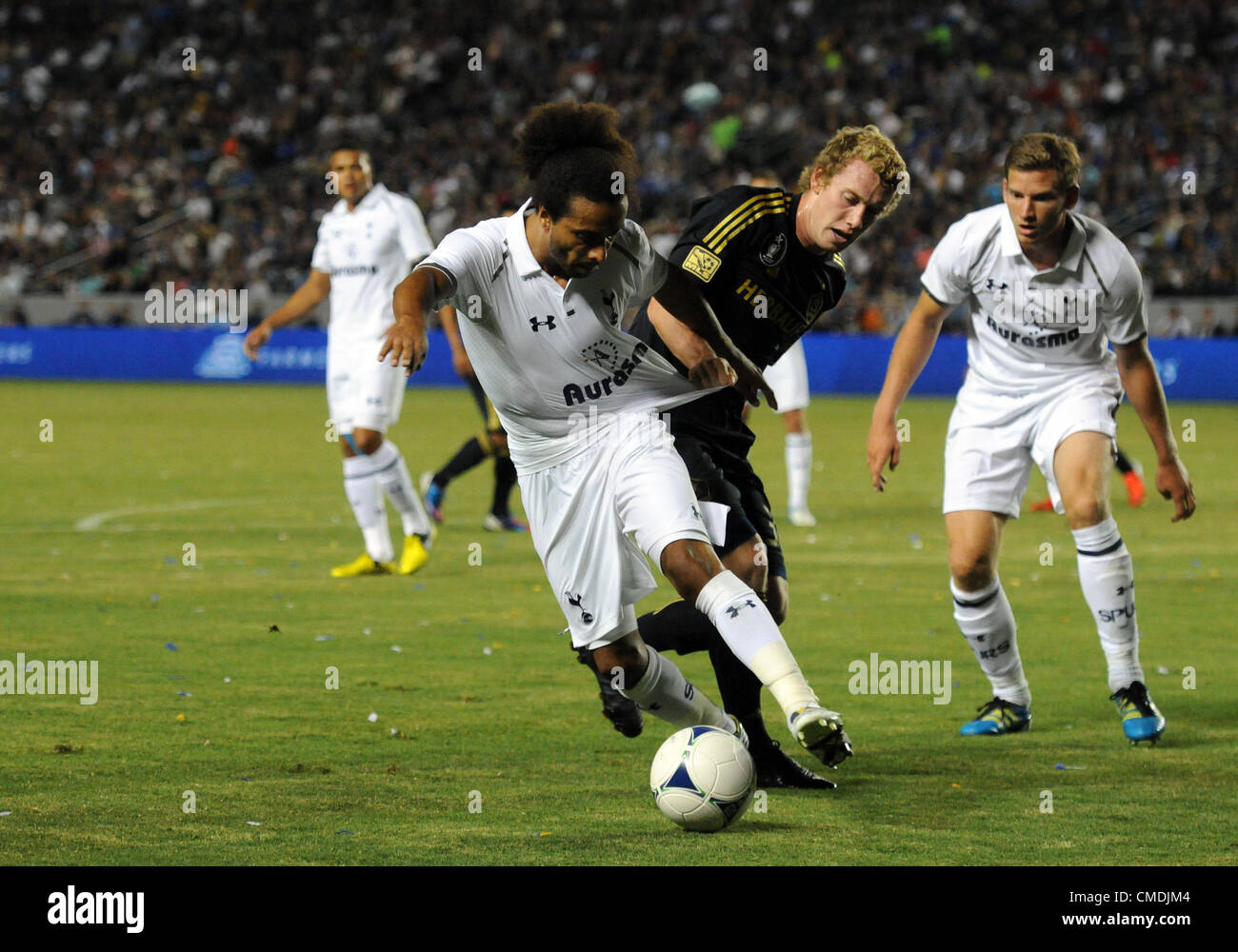 USA. 24.07.2012. Los Angeles, California.  Tottenham Hotspur (32) Benoit Assou-Ekotto and Galaxy (32) Jack McBean fight for the ball during an international friendly soccer match between Tottenham Hotspur and the Los Angeles Galaxy at the Home Depot Center in Carson, CA. Stock Photo