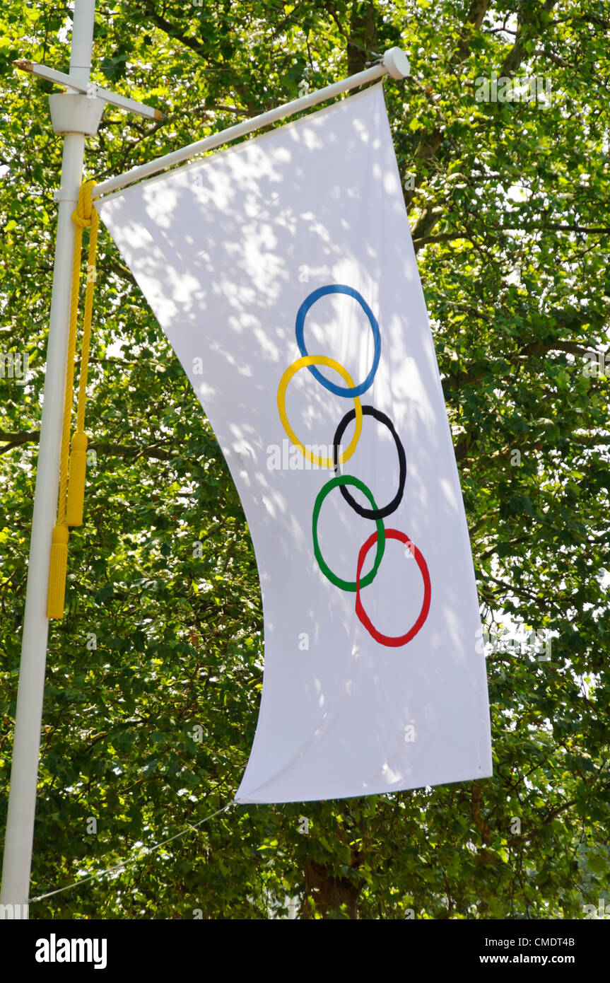 LONDON, UK, Thursday July 26, 2012. Olympic flags are displayed on the Mall one day before London 2012 Olympic Games opening ceremony. Stock Photo