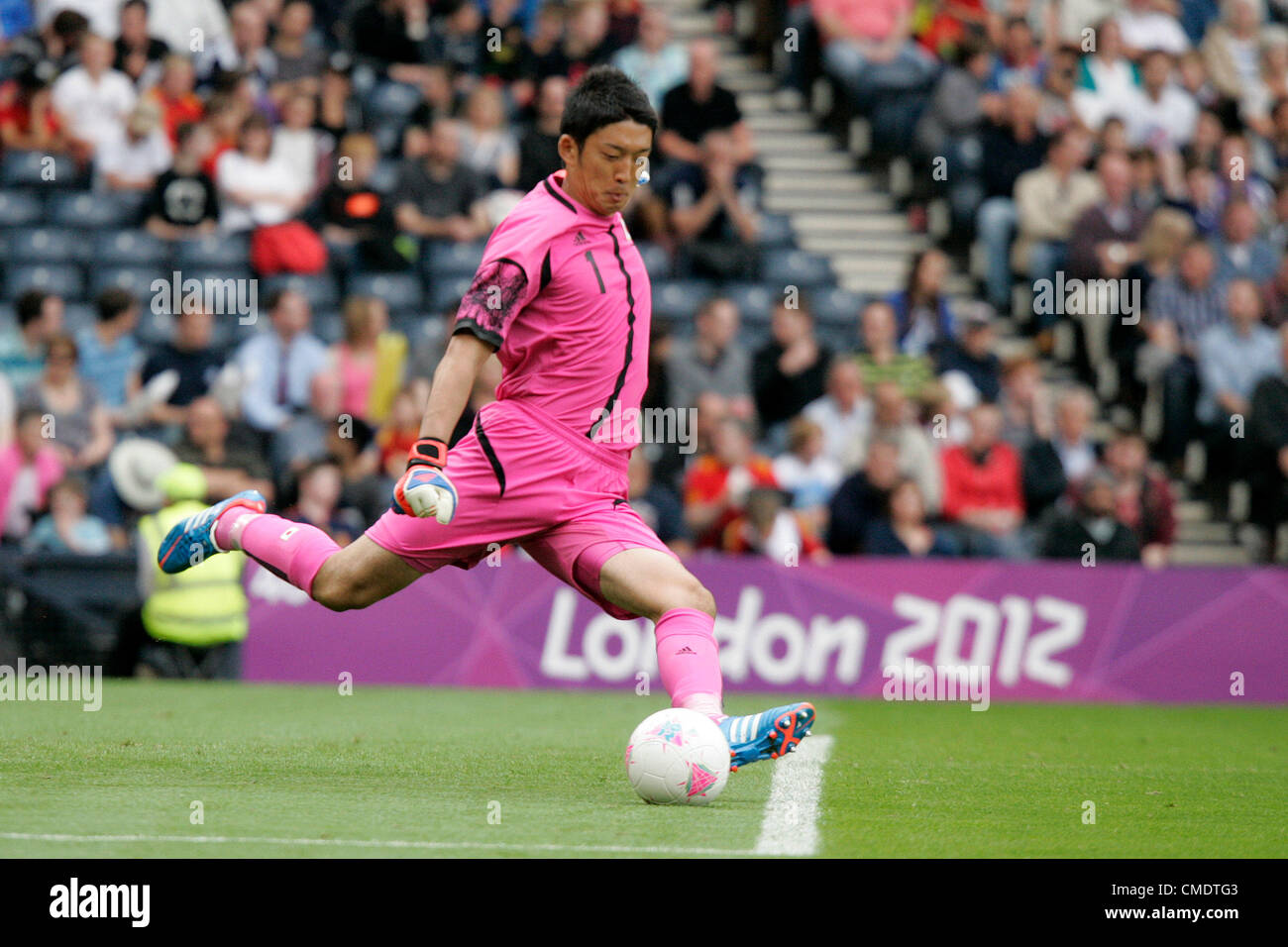 26.07.2012 Glasgow, Scotland.  1 Shuichi Gonda takes a goal kick during the Olympic Football Men's Preliminary game between Spain and Japan from Hampden Park. Japan pulled off a shock win over Spain by a score of 1-0. Stock Photo